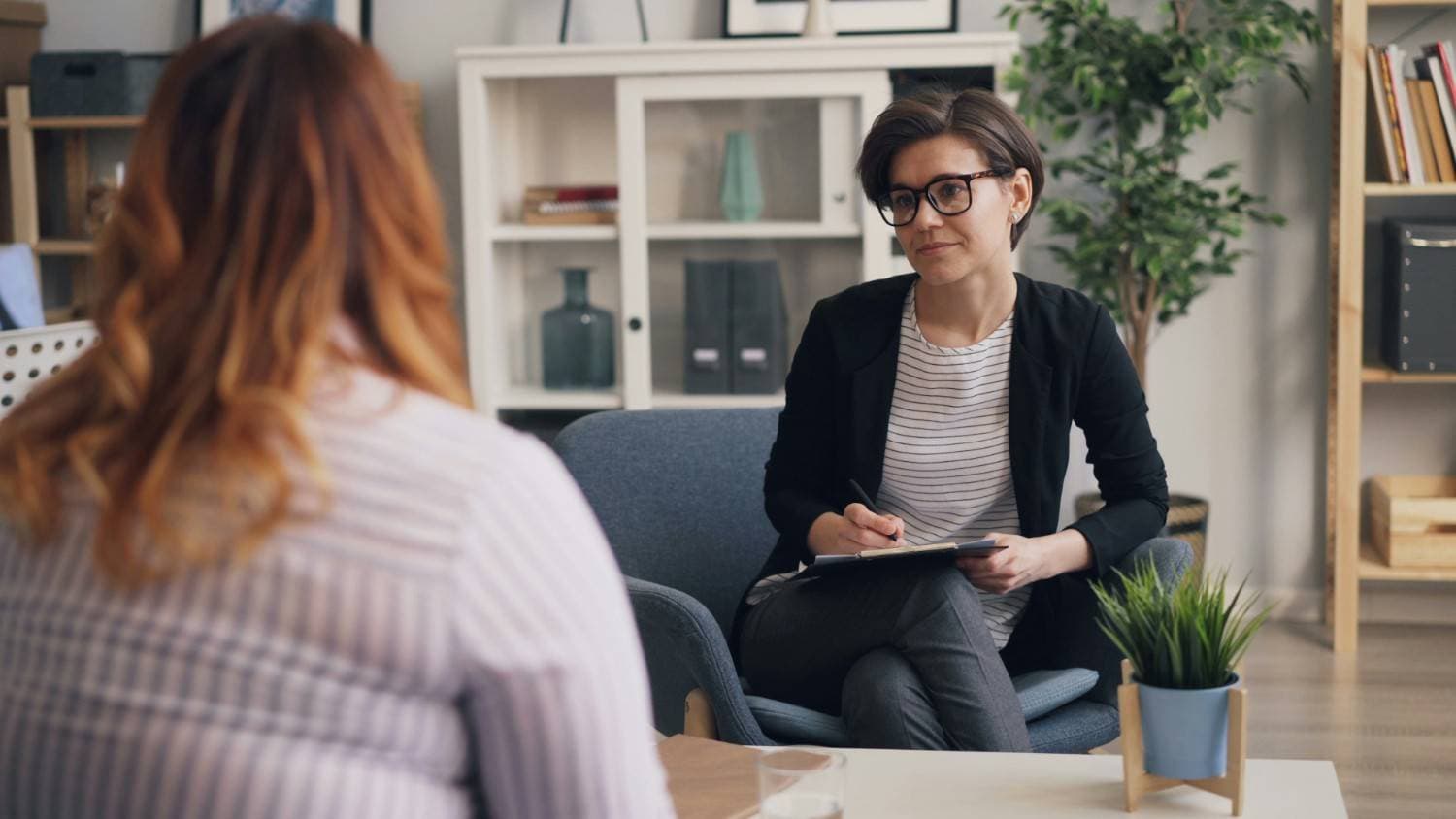 therapist assessing a woman